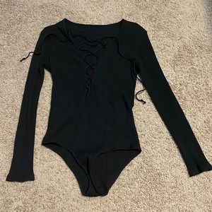 Black tie up body suit